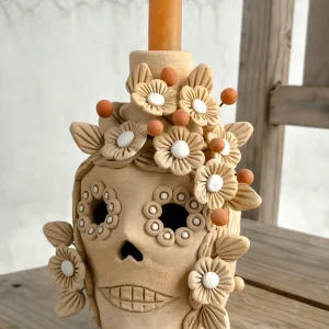 Candelabro de calavera de azúcar