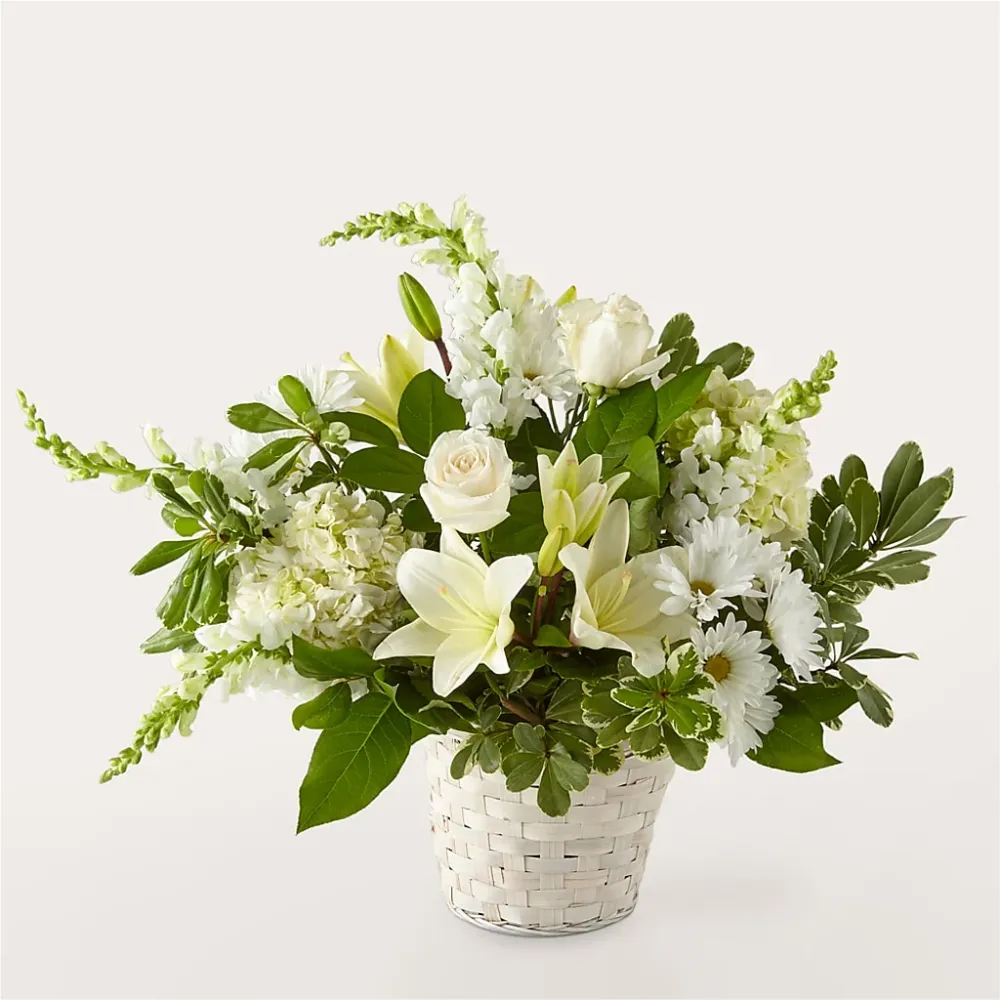 Cesta floral con elegancia de color marfil Deux Gars Des Fleurs