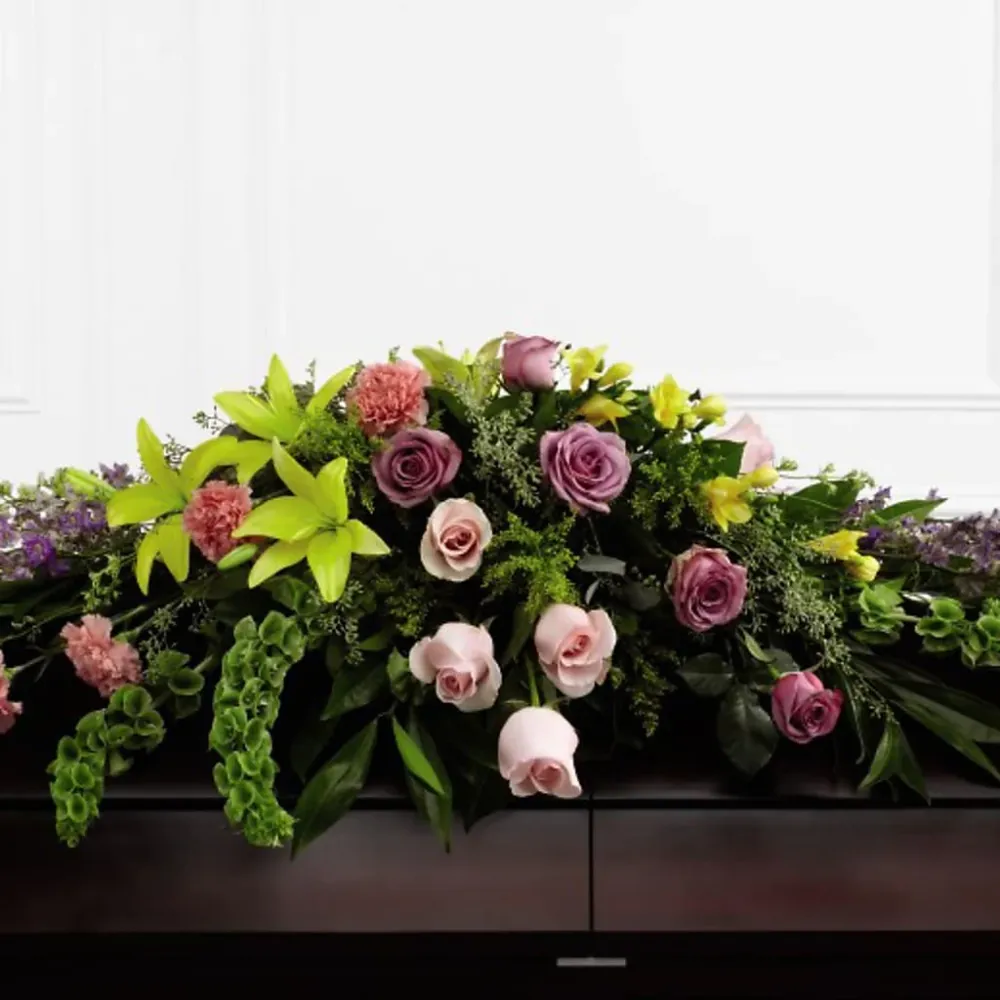 Ramo de ataúd con el mensaje "Amado por siempre" Deux Gars Des Fleurs