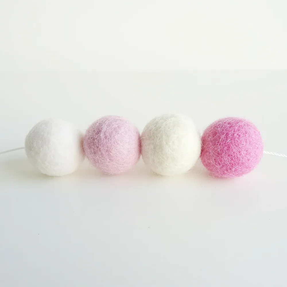 Guirnaldas bolitas de lana rosa blanco