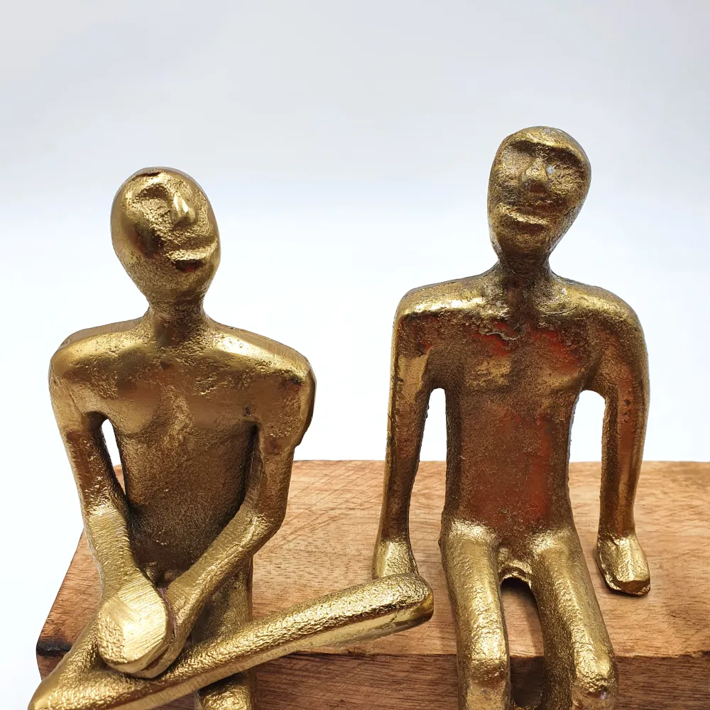 Figura personas dorado 20x9x19 cm Petra Decora