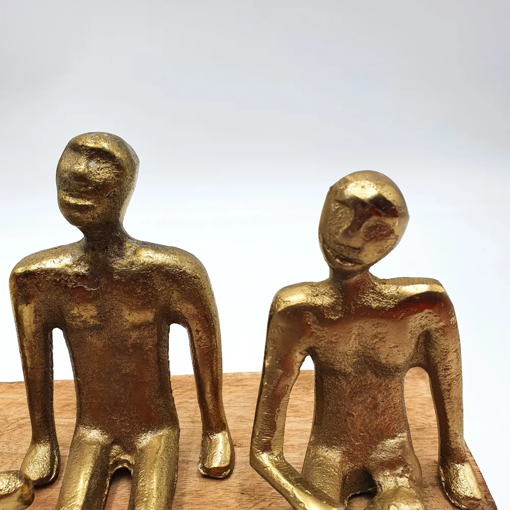 Figura personas dorado 20x9x19 cm Petra Decora