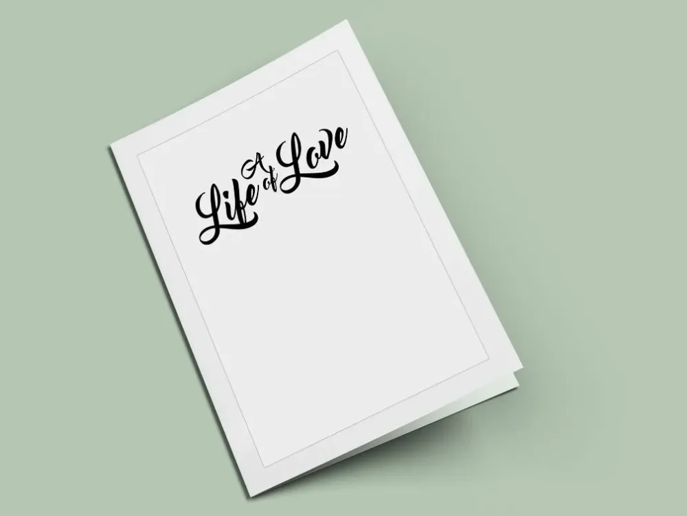 Título del programa funerario "Una vida de amor" con texto en arte de palabras The Funeral Program Site