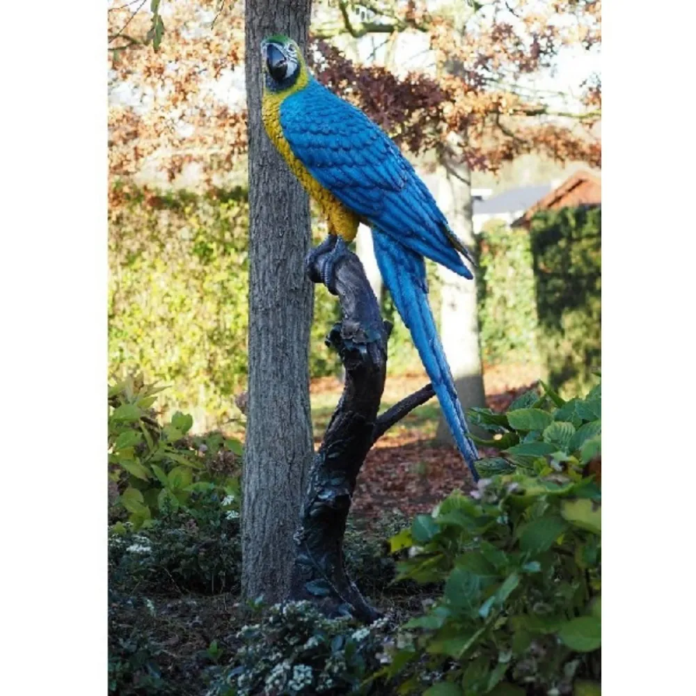 Estatua de bronce de un loro de colores, 168 x 70 x 70 cm (alto x ancho x profundidad). Thermobrass