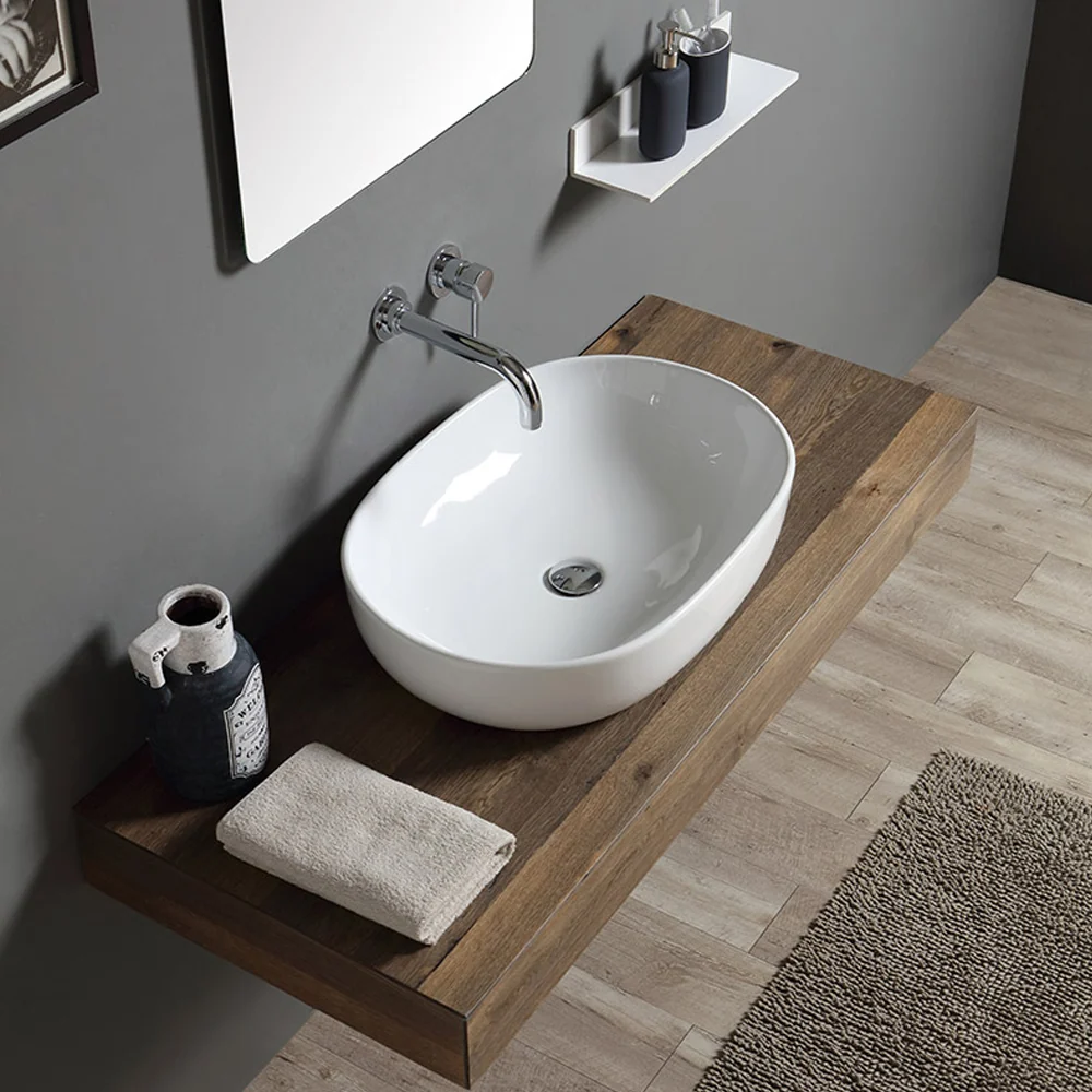 Lavabo de apoyo ovalado en cerámica blanca 58x41 con borde fino